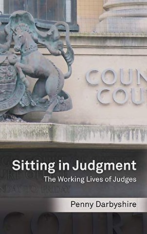 Sitting in Judgment; The Working Lives of Judges