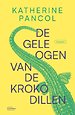 De gele ogen van de krokodillen