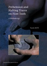 Prehension and Hafting Traces on Flint Tools