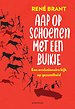 Aap op schoenen met een buikje